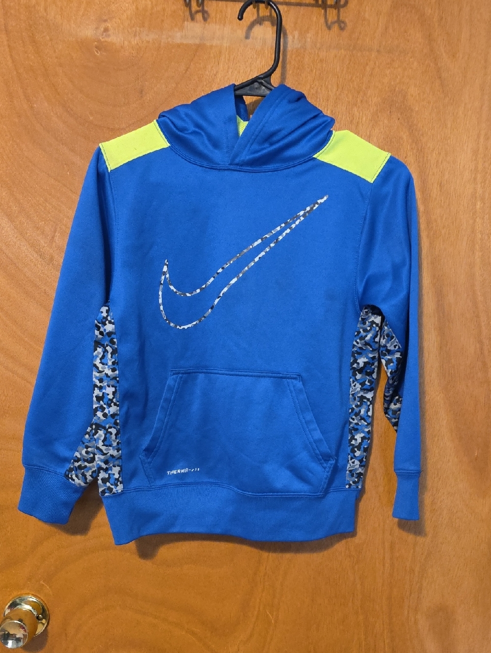 Nike Blue Hoodie with Neon Yellow Accents and Camo Swoosh